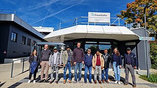 Gruppenbild mit 10 Personen der Delegation und deutschen Partnern